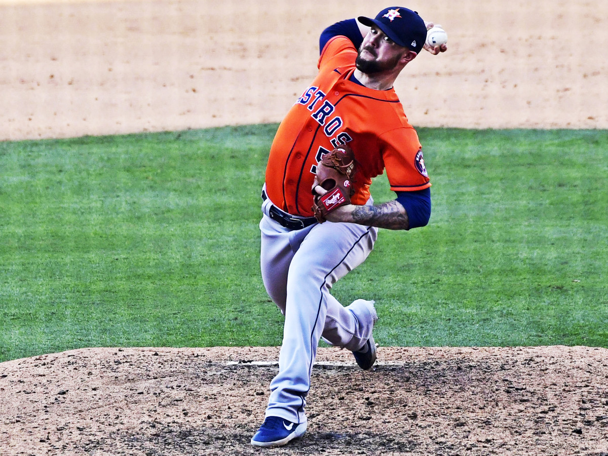 Oct 5, 2020; Los Angeles, California, USA; Houston Astros relief pitcher Ryan Pressly (55) in the ninth inning of game one of the 2020 ALDS against the Oakland Athletics at Dodger Stadium.